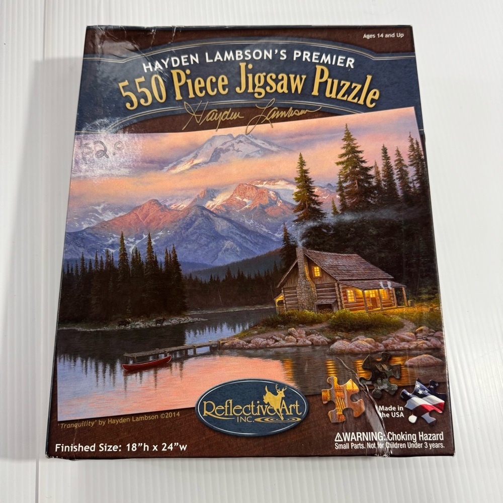 2. Hayden Lambson’s Premier 550 Piece Jigsaw Puzzle - Serene Lakeside Cabin